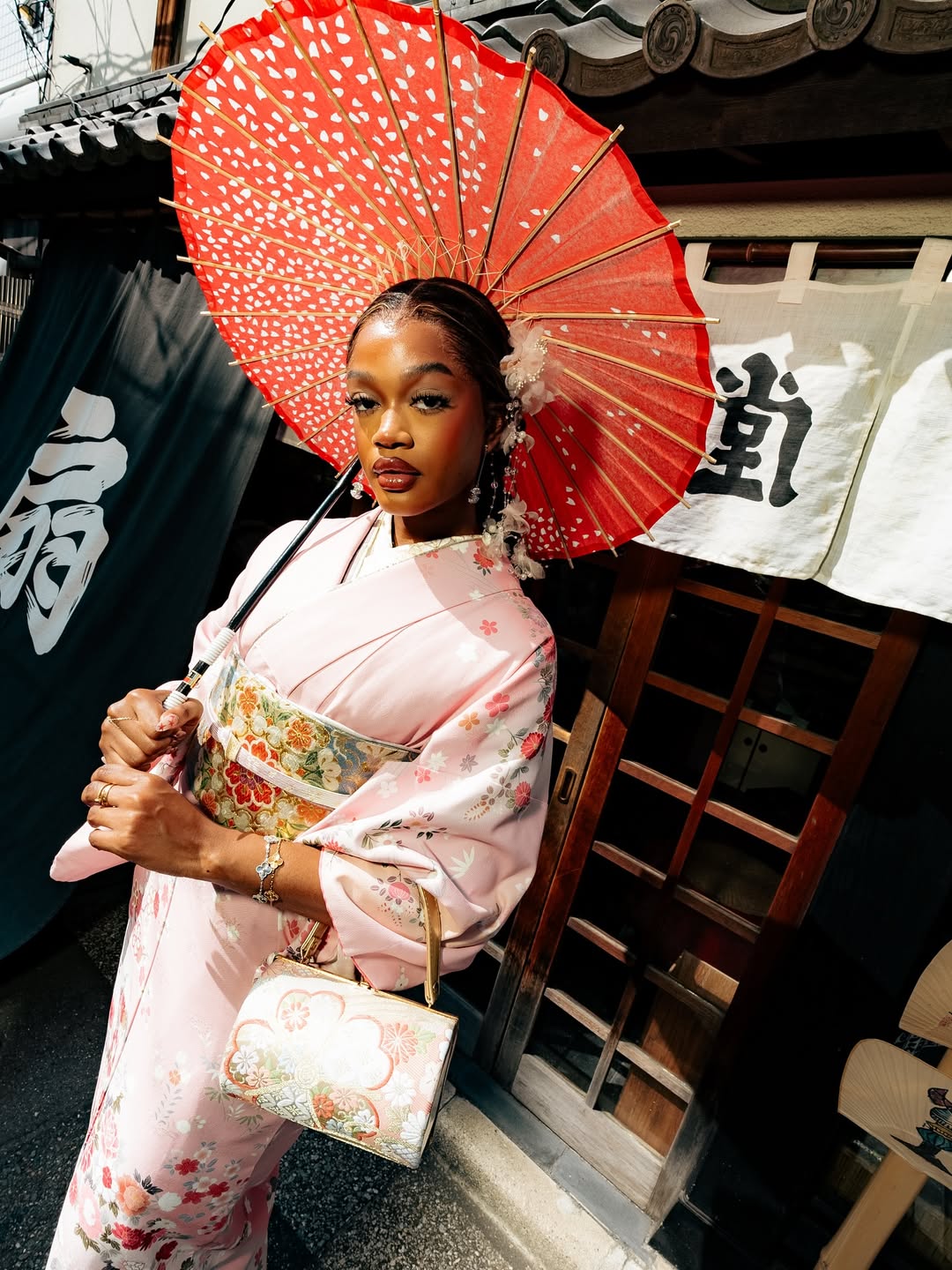 Kimono portrait with a red umbrella in Asakusa, Tokyo