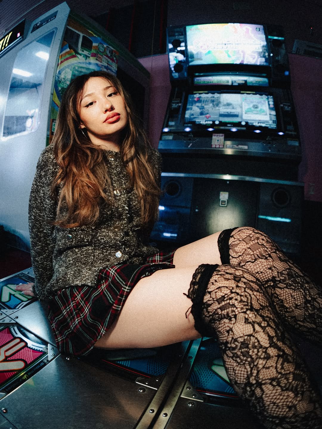 Solo portrait in a Tokyo arcade